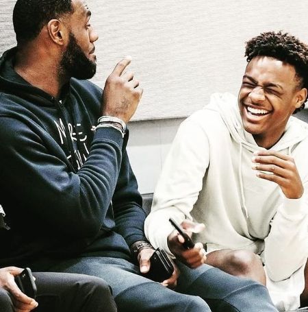 Bronny James with his father LeBron James.